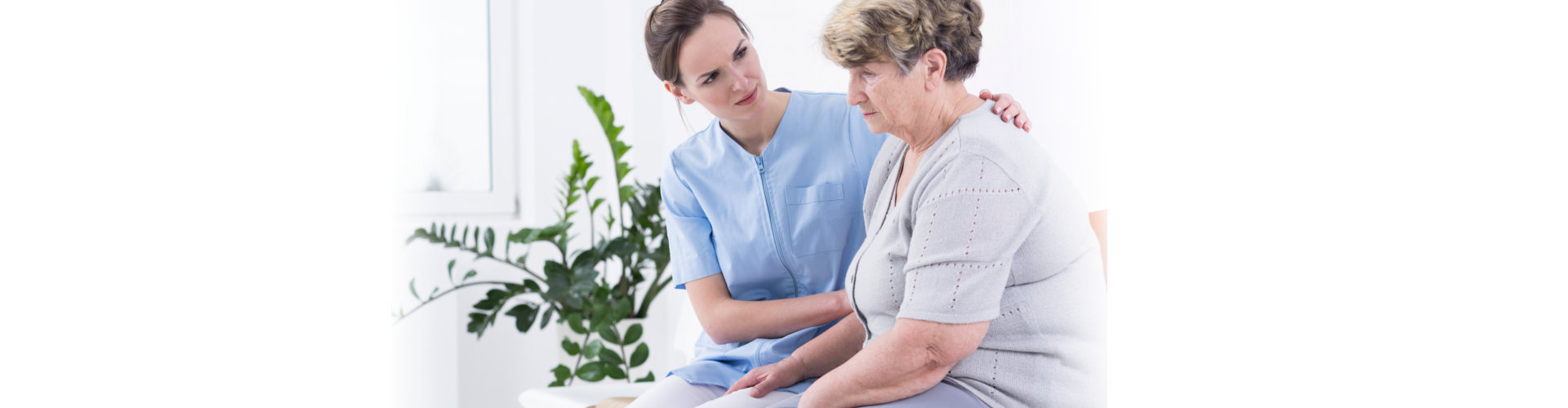 caregiver taking care of the old lady